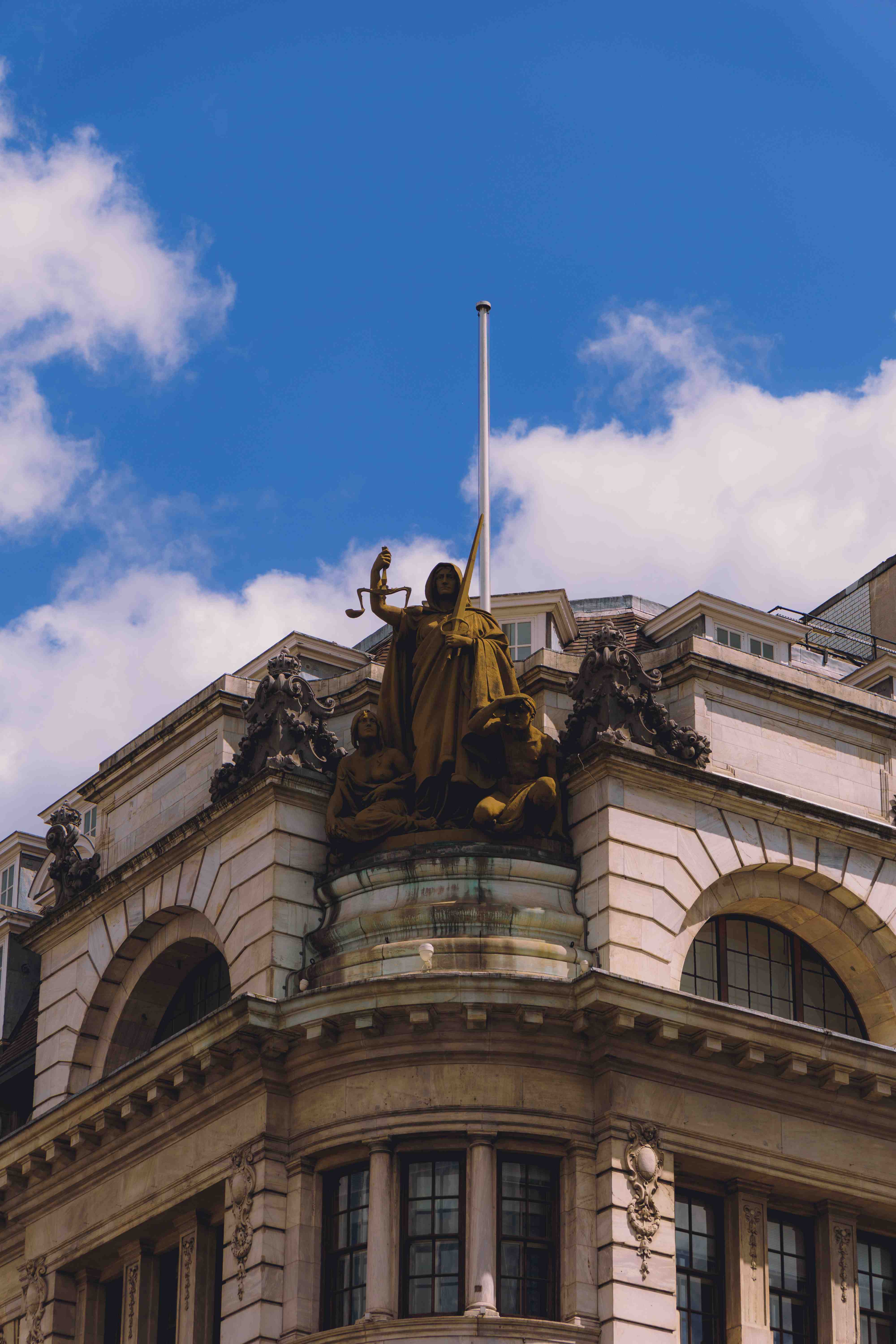 Statue of A Man With A Sword